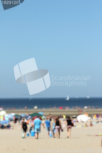 Image of blur background : people relaxing on the beach