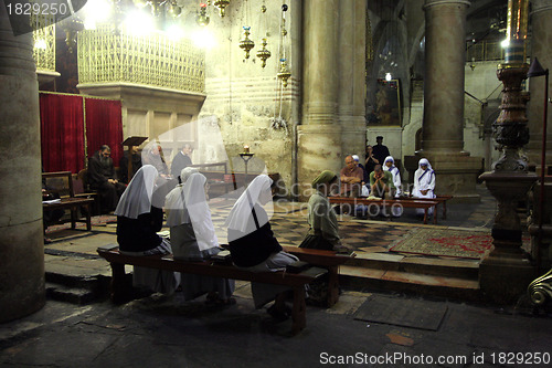 Image of Nuns praying in the Church of the Holy Sepulchre