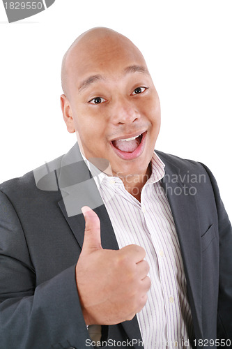Image of Young business man going thumb up, isolated on white 
