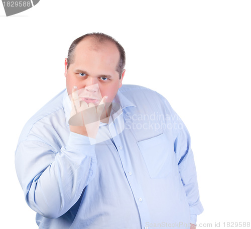 Image of Fat Man in a Blue Shirt, Showing Obscene Gestures