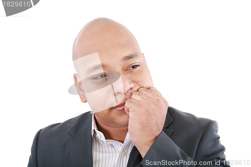 Image of Portrait of a young business man looking away and thinking 