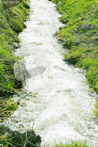 Image of Waterfall in green nature in Switzerland 