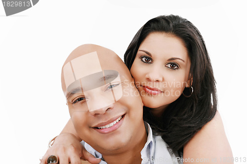 Image of Closeup portrait of a smiling young couple together