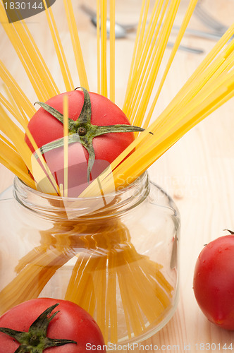 Image of fresh tomato and spaghetti pasta