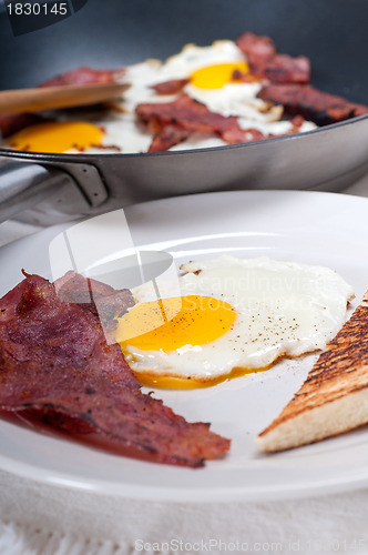 Image of eggs bacon and toast bread