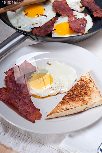 Image of eggs bacon and toast bread