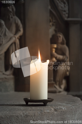 Image of candle in a church