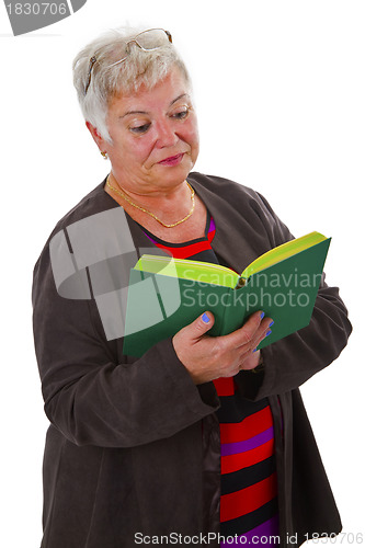 Image of Female senior reading a book