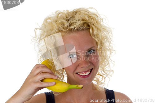 Image of Beautiful young woman with banana