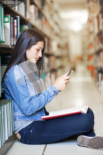 Image of Hispanic student texting