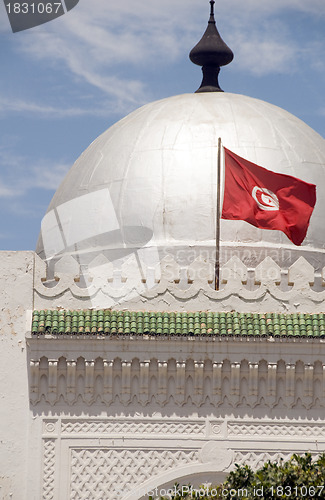 Image of landmark large silver dome mosque and flag Sousse Tunisia Africa