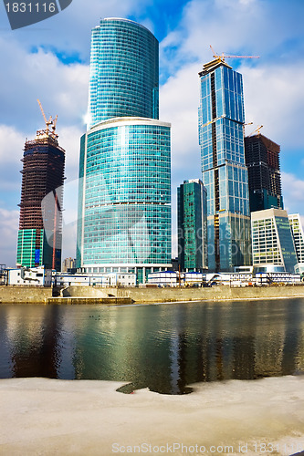 Image of Modern skyscrapers at sunset