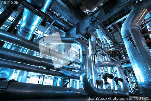 Image of Equipment, cables and piping as found inside of  industrial powe