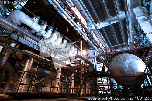 Image of Equipment, cables and piping as found inside of  industrial powe