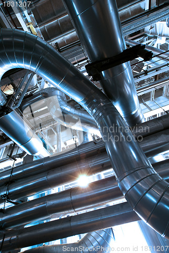 Image of Equipment, cables and piping as found inside of  industrial powe