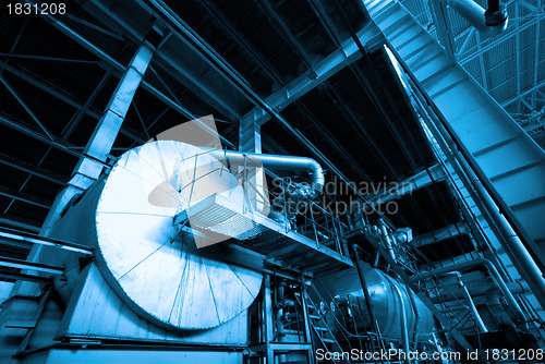 Image of industrial ladders, cables, pipelines in blue tones