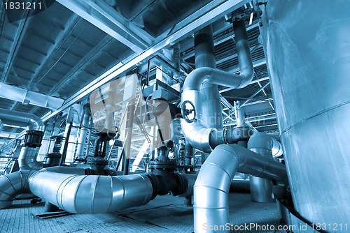 Image of Equipment, cables and piping as found inside of  industrial powe