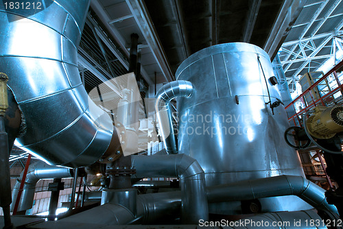 Image of industrial ladders, cables, pipelines in blue tones