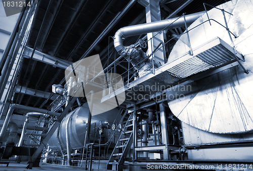 Image of industrial ladders, cables, pipelines in blue tones