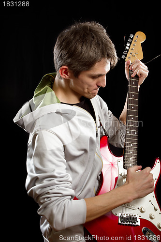 Image of Man With The Guitar