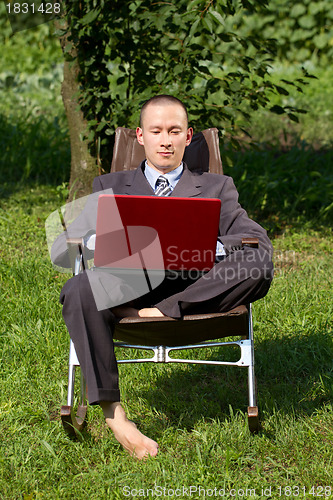 Image of Businessman Working Outdoors