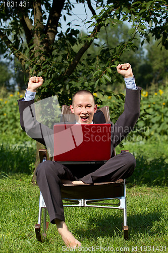 Image of Businessman Working Outdoors