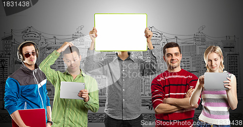 Image of Male With Write Board In His Hands