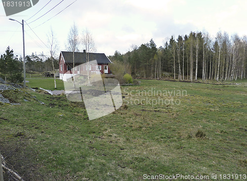 Image of pastoral landscape in norway with single house