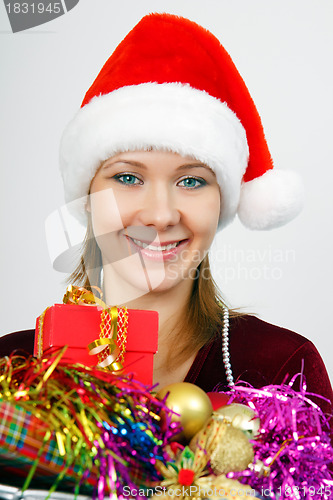 Image of Portrait attractive young woman with Christmas decorations