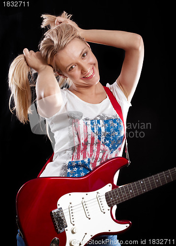 Image of Woman Playing the Guitar