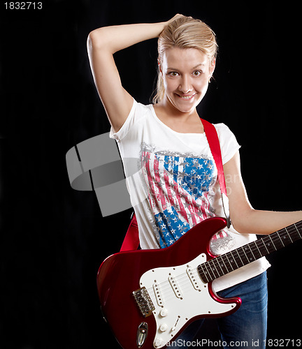 Image of Woman Playing the Guitar