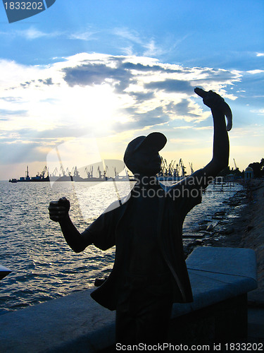 Image of The fisherman with a caught fish