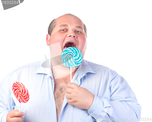 Image of Fat Man in a Blue Shirt, Eating a Lollipop