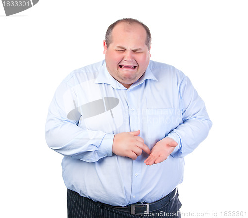 Image of Unhappy Fat Man in a Blue Shirt
