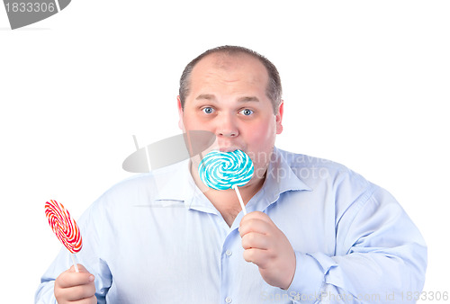 Image of Fat Man in a Blue Shirt, Eating a Lollipop