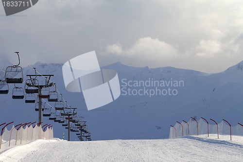 Image of Snow skiing piste and ropeway