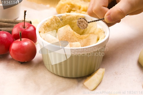 Image of Detail of child hands making apple pie