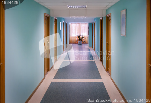 Image of The corridor with blue walls