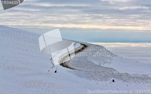 Image of Dirt road in the snowy mountains