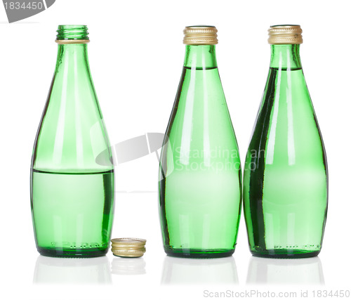 Image of three soda water bottles isolated on white