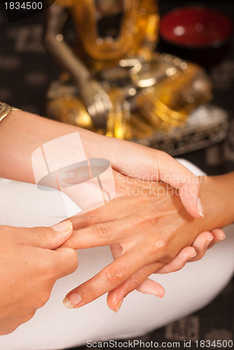 Image of Massaging hands