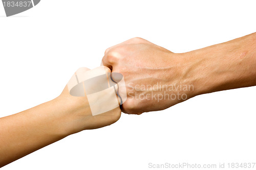 Image of big hand and little hand as fists together