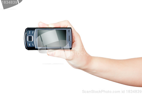 Image of hand holding a black mobile phone