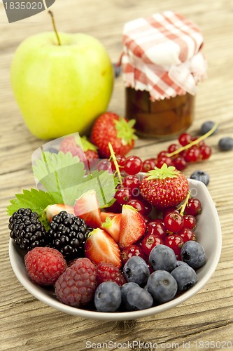 Image of fresh tasty berry collection on table in summer