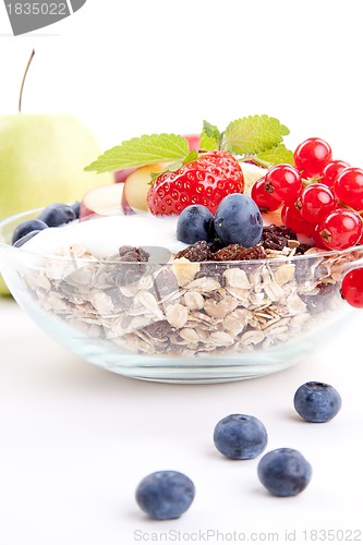 Image of deliscious healthy breakfast with flakes and fruits isolated