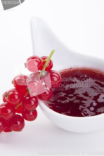 Image of tasty fresh red currant jam isolated on white