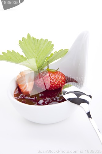 Image of deliscious strawberry jam with fresh fruits isolated