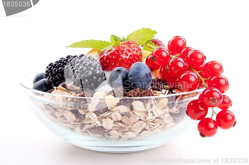 Image of deliscious healthy breakfast with flakes and fruits isolated