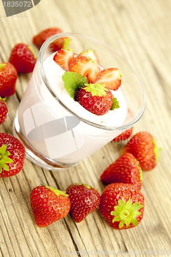 Image of fresh tasty strawberry yoghurt shake dessert on table