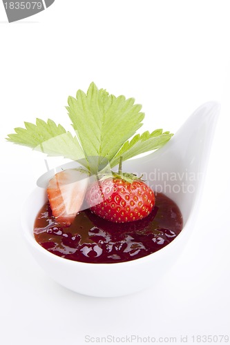 Image of deliscious strawberry jam with fresh fruits isolated